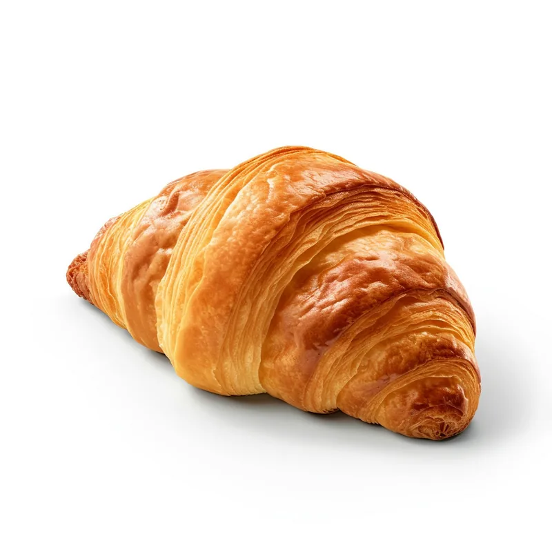 En gyllene croissant på vit botten